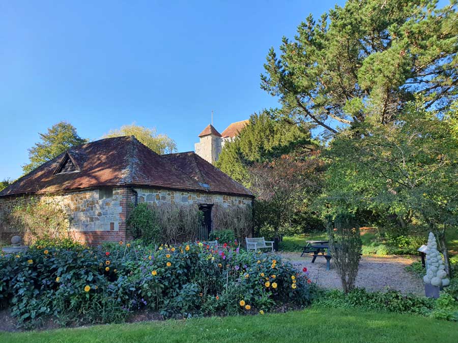 The Dovecote and flowerbeds at Michelham Priory House and Gardens East Sussex