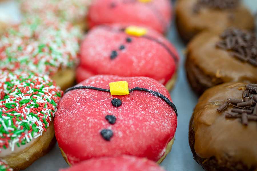 Doughnuts at the Christmas Festive Fair at the Forum Norwich Norfolk UK