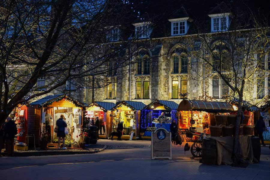 Market stalls at dusk Winchester Christmas Market