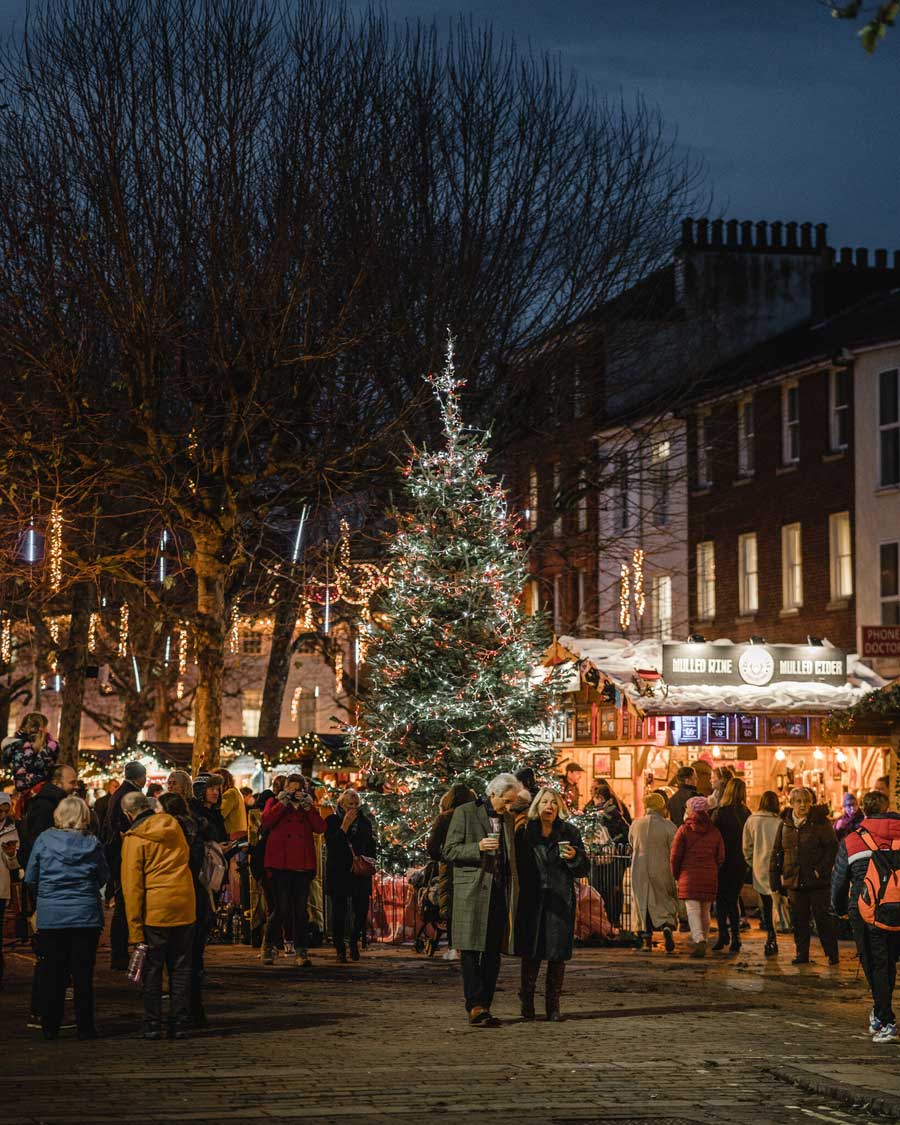 Christmas tree and market stalls at York Christmas Market