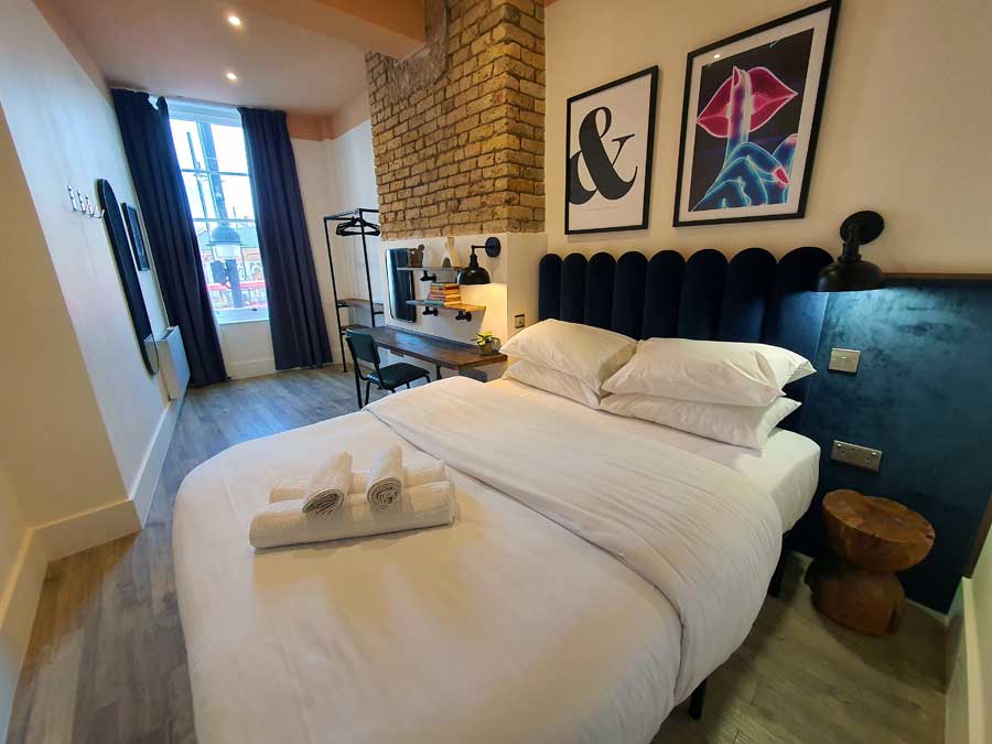 One of the two double bedrooms at Your Apartment complex in Brixton London