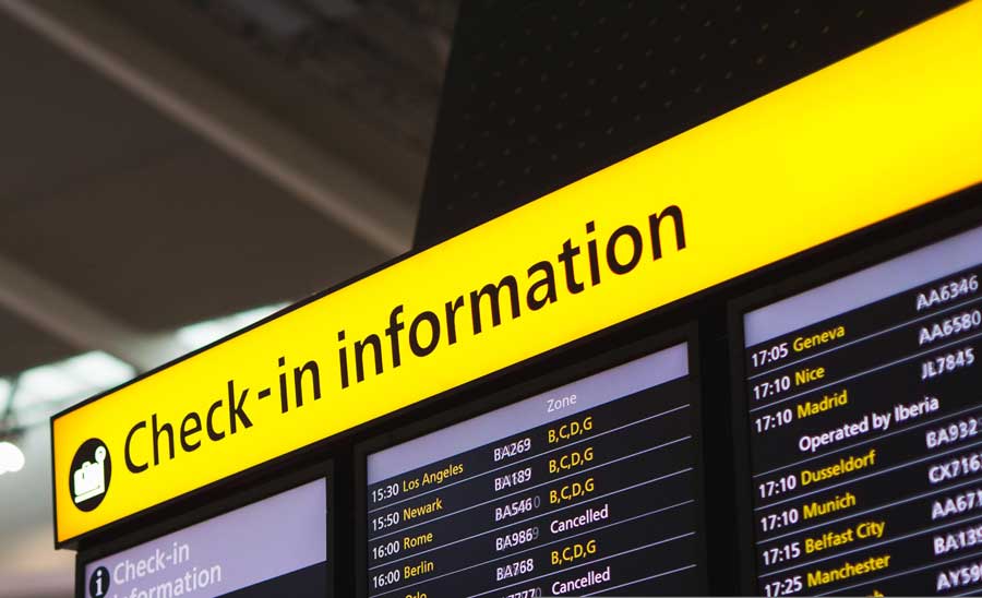 Check in information sign at airport