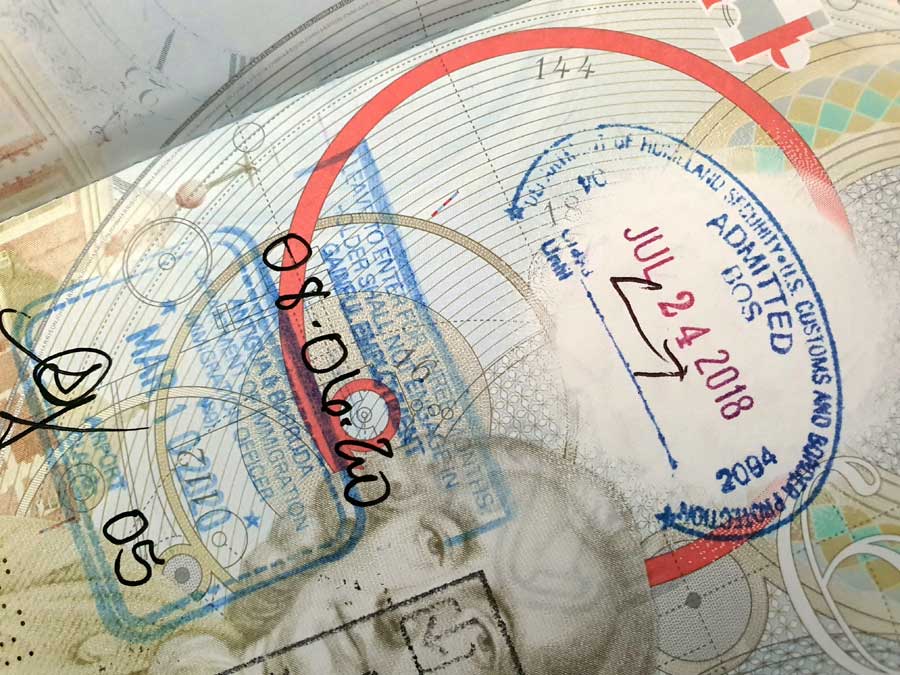 Passport pages showing entry visa stamps Things to know when you win a holiday