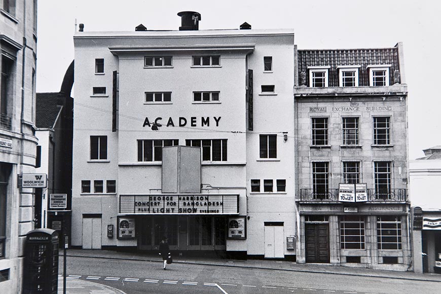 The Academy Cinema, West Street, photographed on 22 October 1972. Built in 1912 on the site of the Turkish Baths (1868 – 1911) it was then the largest of Brighton’s few cinemas until dwarfed by the Regent, opened in July 1921.
It was the second cinema to be converted to talking pictures, on 14 October 1929. After a long life of more than 60 years it closed on 24 January 1973 and it was demolished during April and May in that year, to be replaced by yet more offices.
