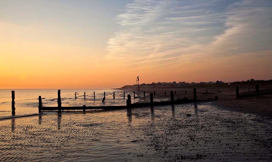Sandy beach at Leysdown-on-Sea, a traditional seaside resort located on the Isle of Sheppey in North Kent, England.