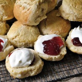 Fresh baked scones served with strawberry jam and plant based cream