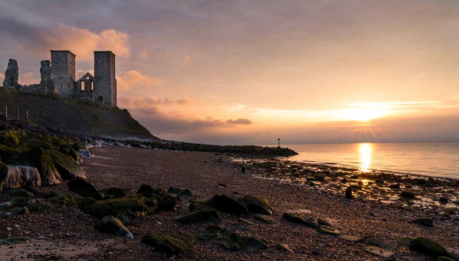 Reculver Towers and Roman Fort at sunset, Kent, UK