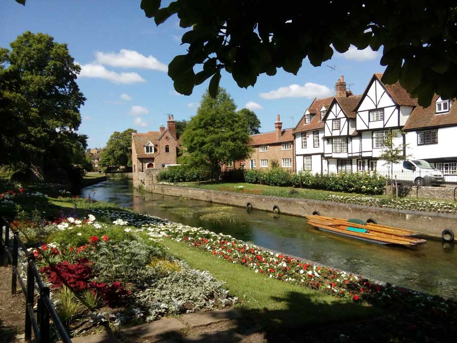 Spring flowers and the river Stour at Westgate Public Gardens in Canterbury, Kent UK