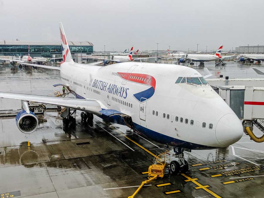 British Airways aircraft at gate at Terminal 5 Heathrow UK