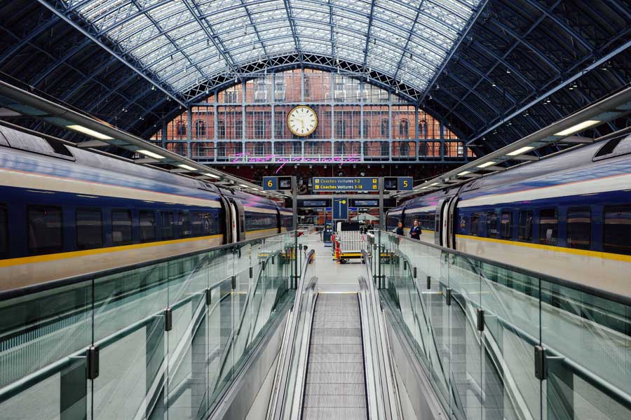 2 Eurostar trains on platform at St Pancras International Station Euston Road London UK