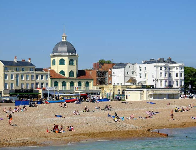 Worthing Dome cinema, beach and sea viewed from Worthing pier