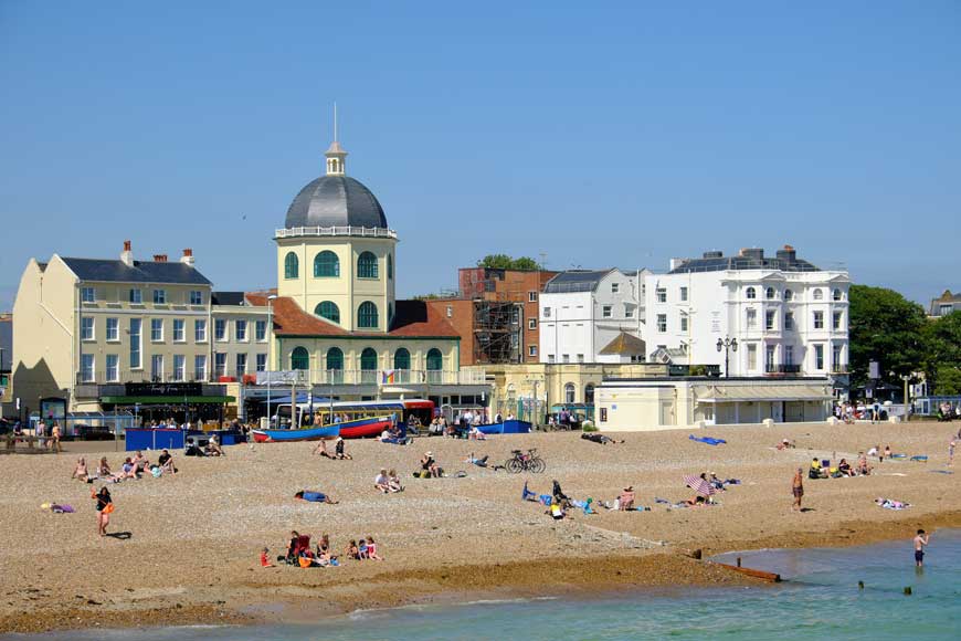 Worthing Dome cinema, beach and sea viewed from Worthing pier