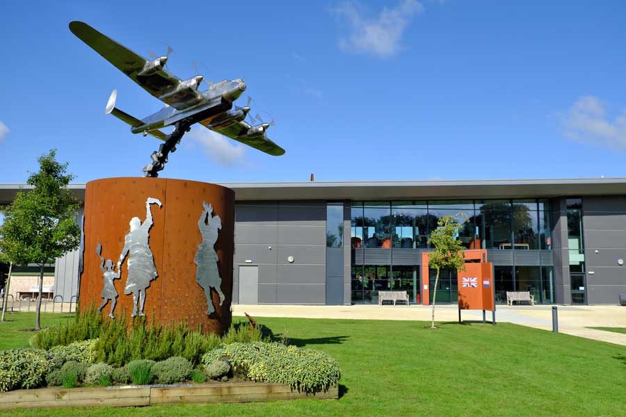 Memorial model of Lancaster bomber outside International Bomber Command Centre commemorating Operation Manna in WW2
