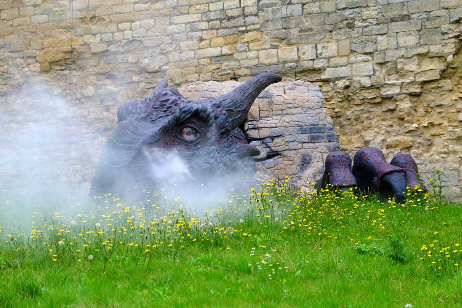 Lucy the smoke breathing Dragon breaking through the wall at Lincoln Castle