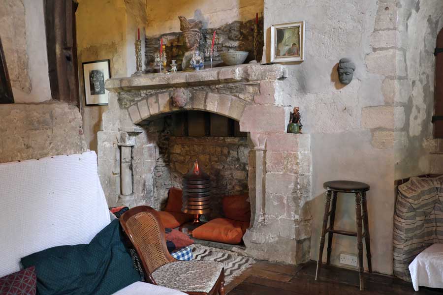Norman fireplace in the Music Room at The Manor, Hemingford Grey in Cambridgeshire