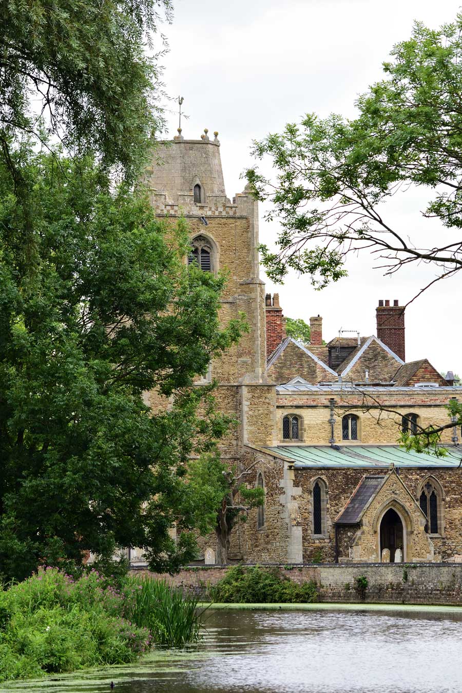St James church and River Great Ouse Hemingford Grey Cambridgeshire