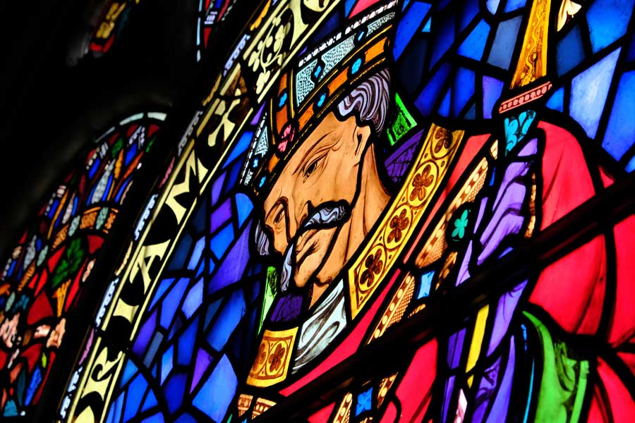 Close-up of stained-glass window showing Bishop Remigius at Lincoln Cathedral