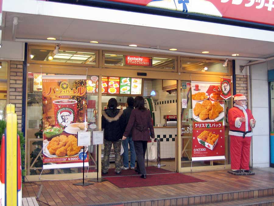 People queuing for food at a KFC outlet in Japan in December
