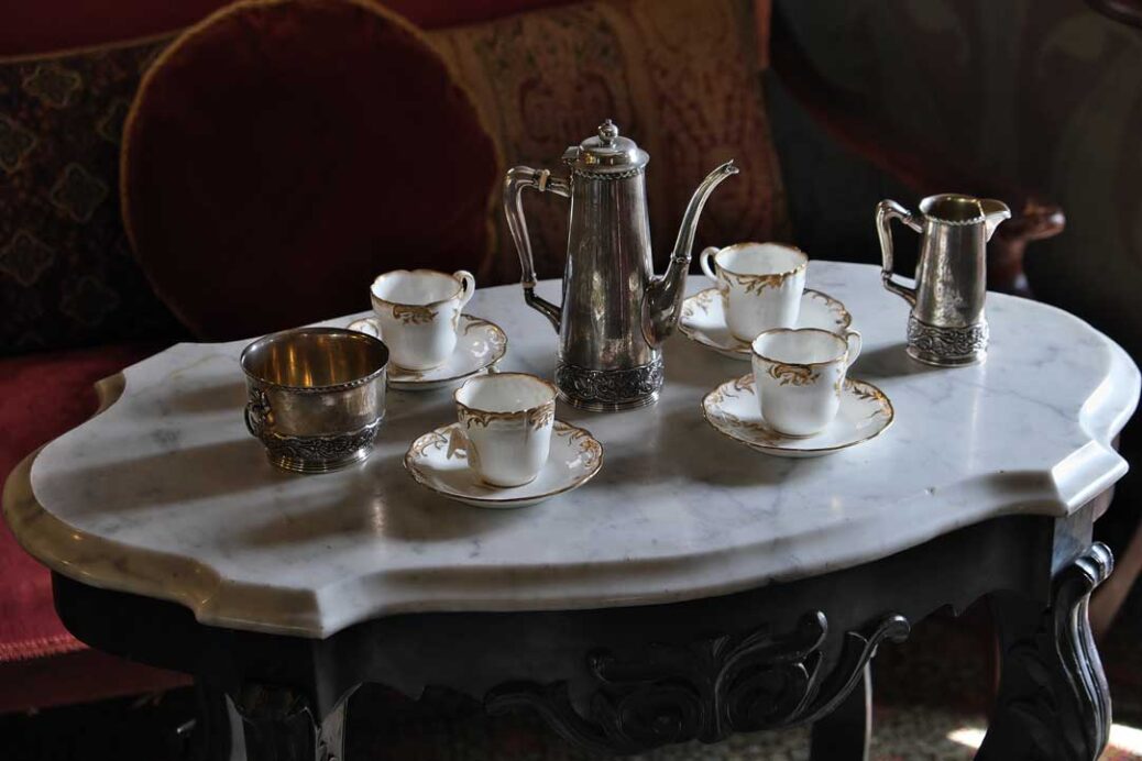 Victorian era coffee service on marble top table at Ebenezer Maxwell Mansion Philadelphia