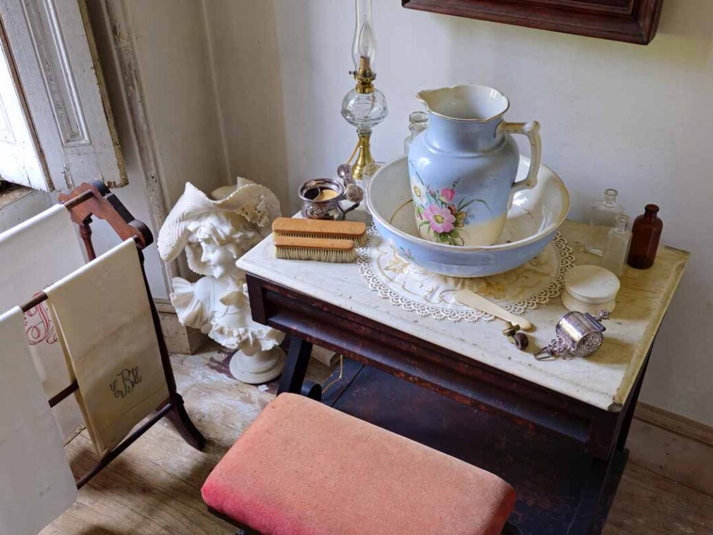 Victorian era washstand with jug and bowl in gentleman's bedroom at Ebenezer Maxwell Mansion Philadelphia