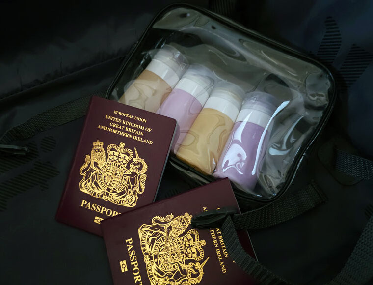 4 x 65ml bottles in clear plastic bag with 2 UK passports in a suitcase