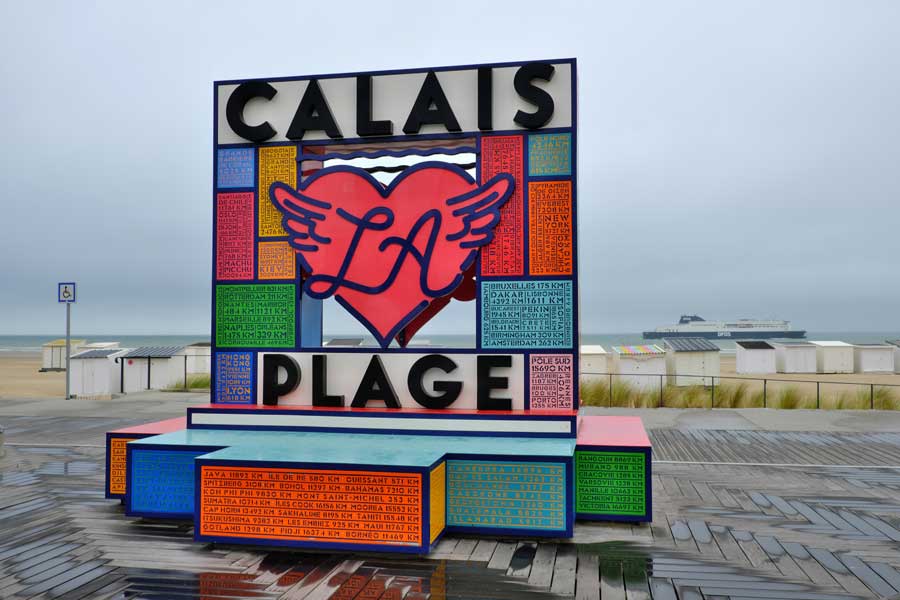 Large Calais Plage sign on the boardwalk in Calais France