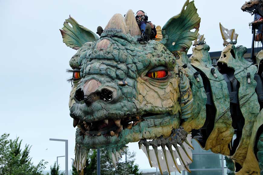 Close up of the head and red eyes of the Calais Dragon in Calais France