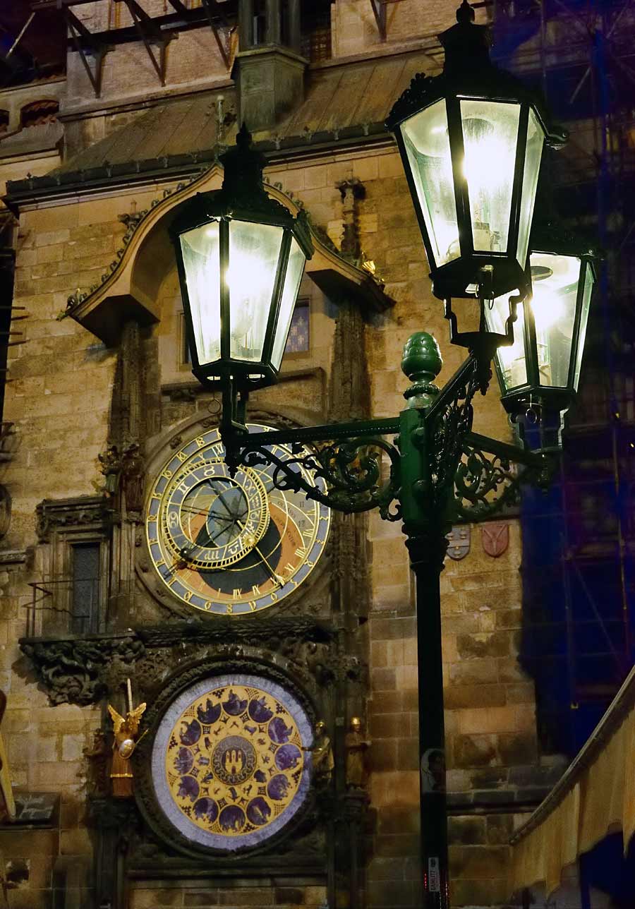 Prague astronomical clock lit by the street lights