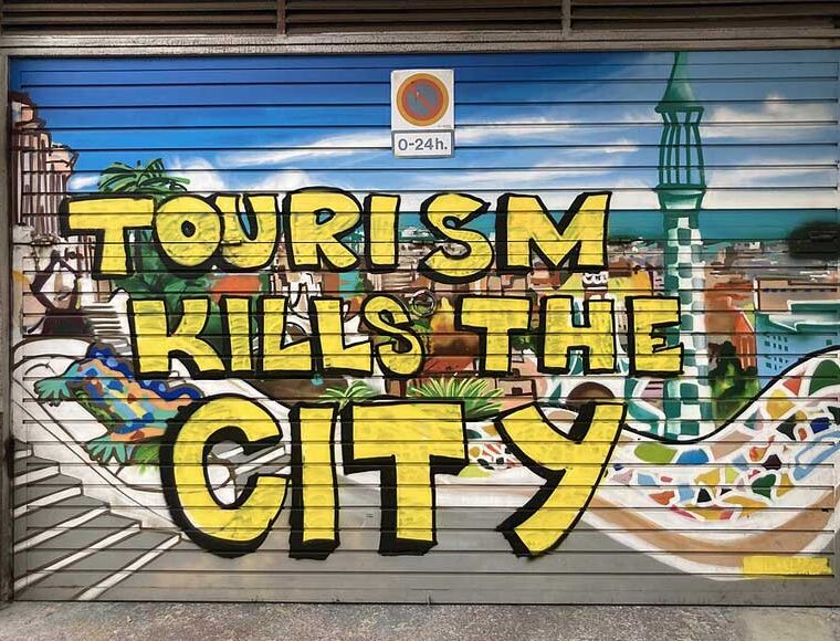 Tourism kills the city street art in Barcelona