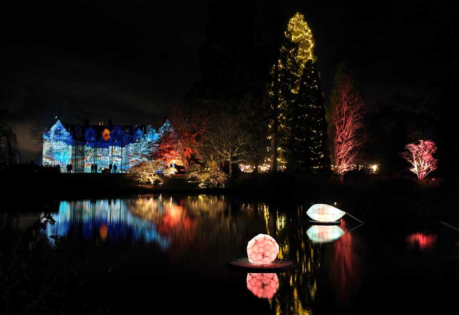Looking across Mansion Pond at the illuminated Mansion House
