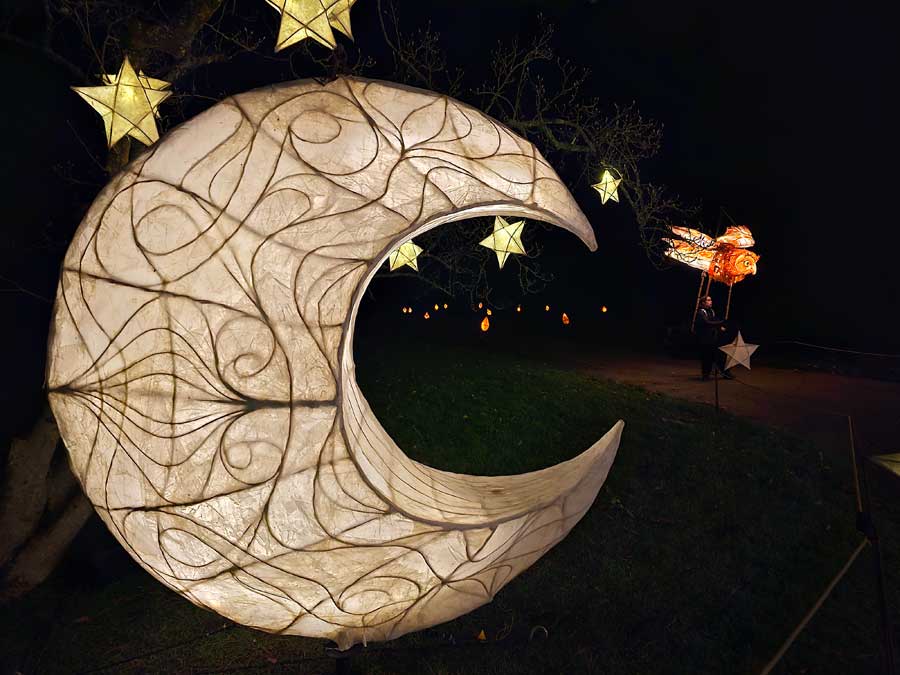 Illuminated paper lantern moon, stars and owl  at Wakehurst Glow Wild