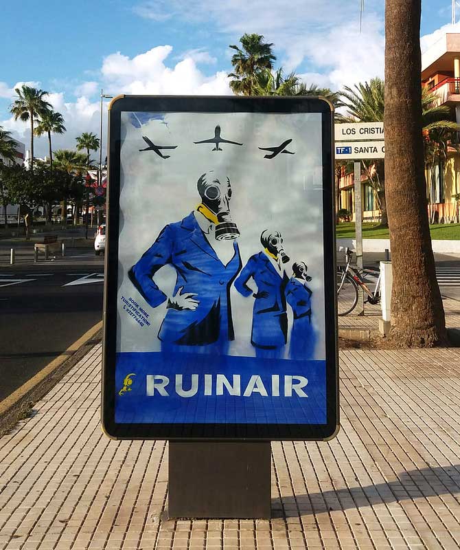 'RUINAIR' anti-tourist graffiti poster in Playa de las Americas and Los Cristianos, Tenerife. By HOGRE a graffiti artist addicted to subvertising, creative vandalism and radical propaganda.