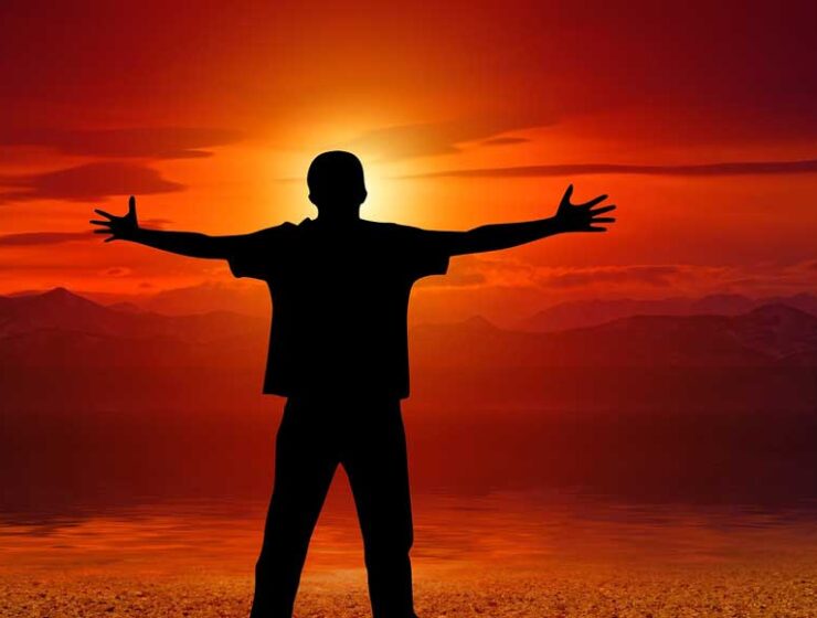 Silhouette figure at sunset