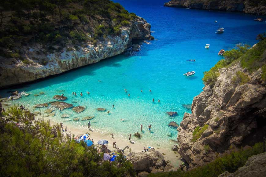 People on a beach in Mallorca in the 
summer holidays