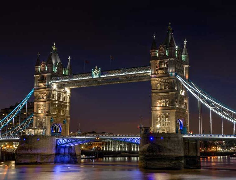 Tower Bridge in London, UK lit up at night