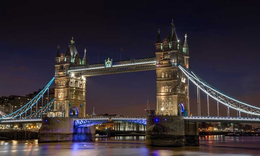 Tower Bridge in London, UK lit up at night