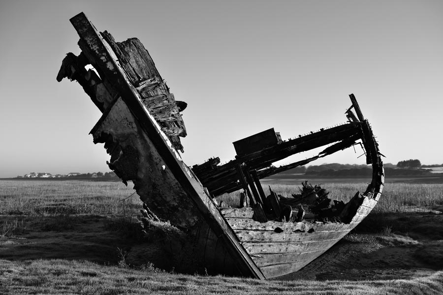 Wreck of fishing trawler in the Wyre Estuary viewed from the Fleetwood Marsh Nature Reserve