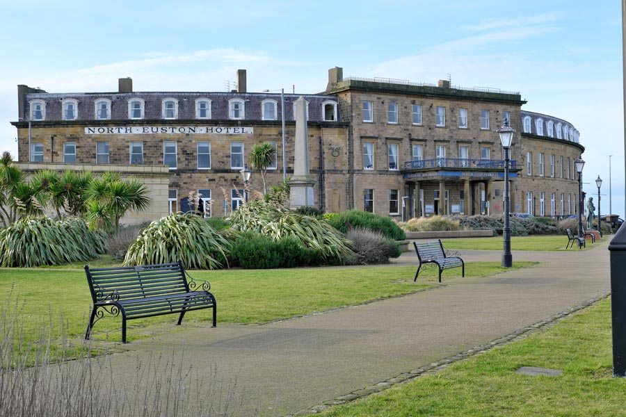 North Euston Hotel Fleetwood, a semicircular building of ashlar with a slate roof, viewed from Euston Gardens