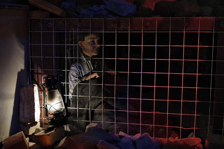 Model child in Morrison Shelter at Home Front exhibition at Newhaven Fort, East Sussex