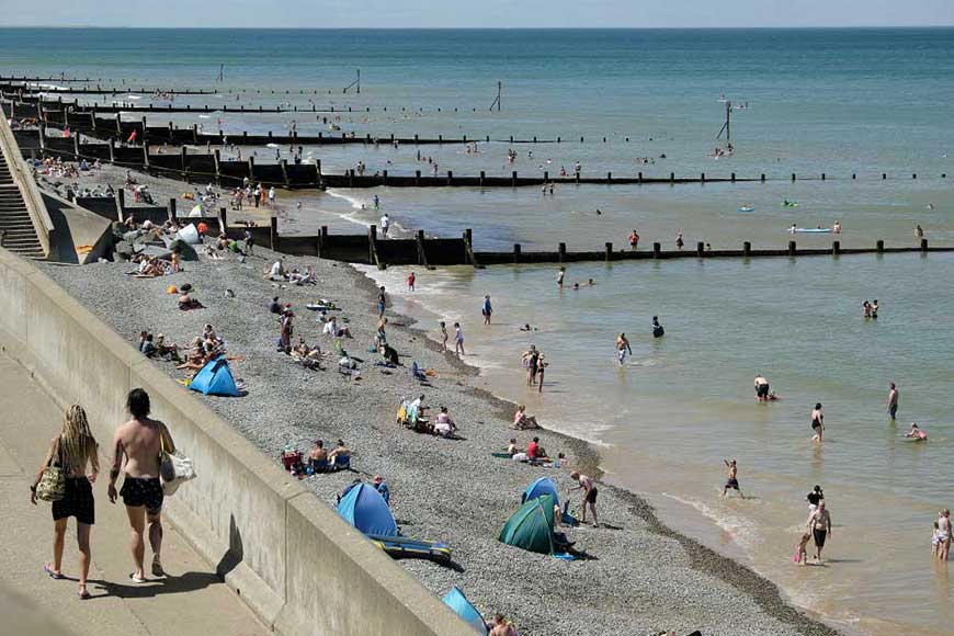 Holidaymakers on Sheringham beach in Norfolk