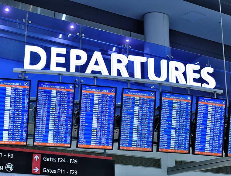 Departures board at Philadelphia Airport USA