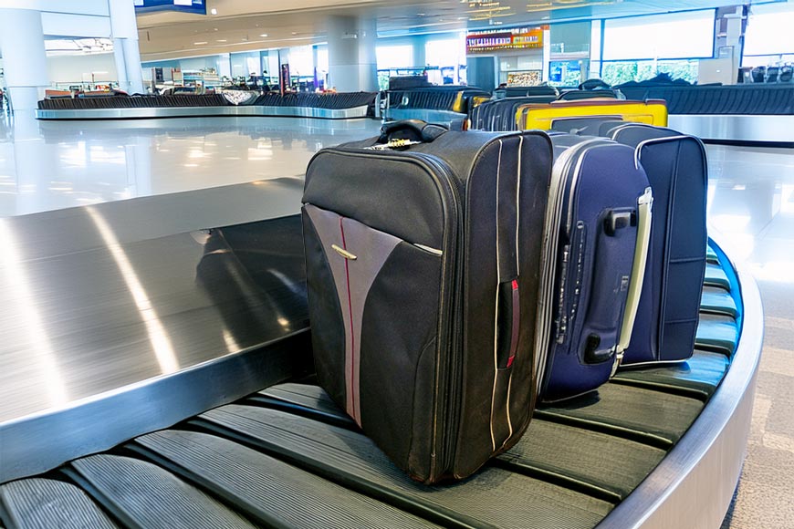Luggage on a baggage reclaim carousel.

Flight cancelled