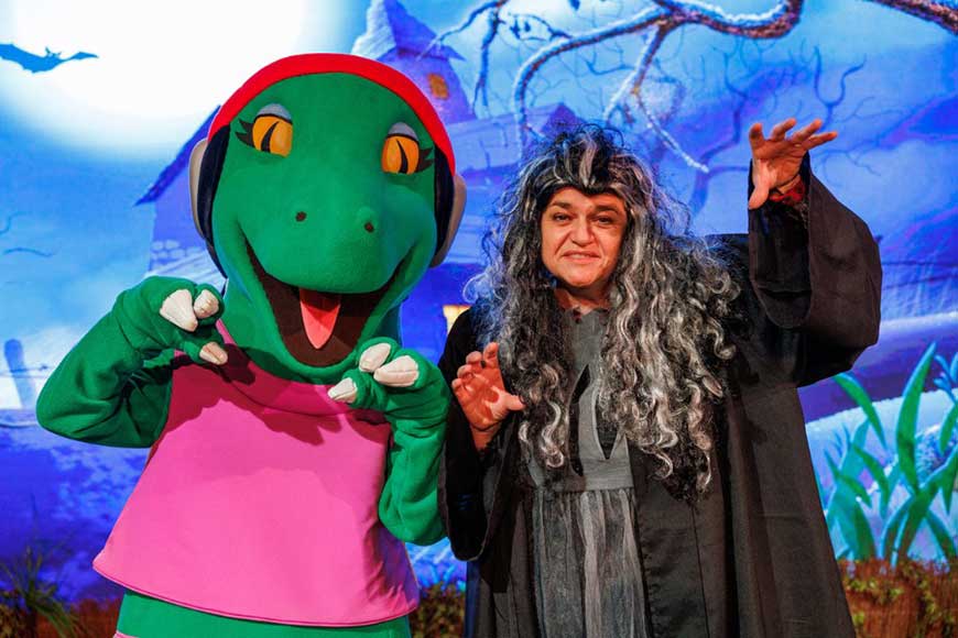Dippy the dinosaur and witch at Roarr in Norfolk