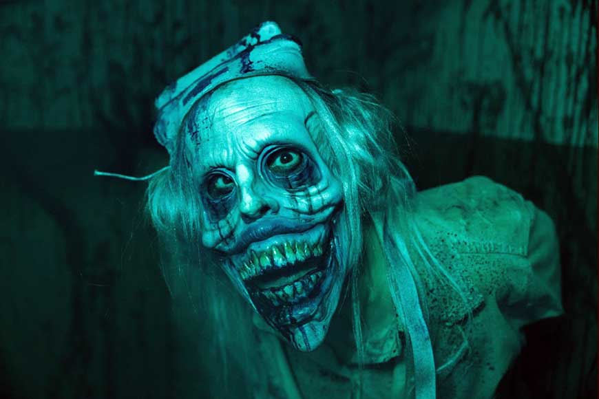 Spooky clown with skull like face