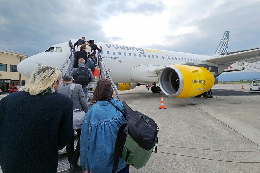 Passengers with hand luggage climbing the steps to board Airbus A319.

Hand luggage rules 2026