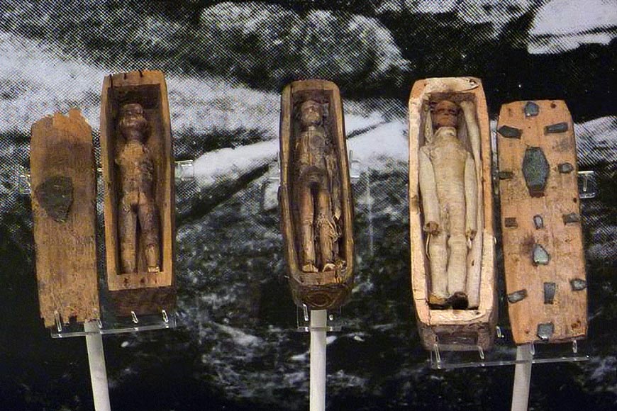 Arthur's Seat coffins, a collection of 17 miniature wooden coffins discovered in 1836 on a hill in Edinburgh, Scotland. Each coffin contains a small carved figure, and only eight of the original seventeen survive today, currently on display at the National Museum of Scotland
