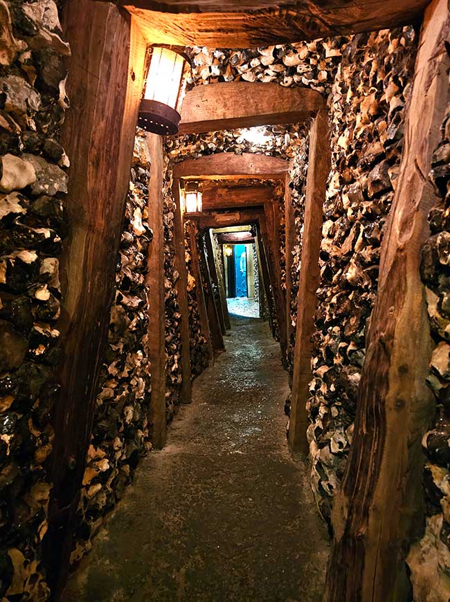 Stone tunnels inside The Forbidden Corner in North Yorkshire