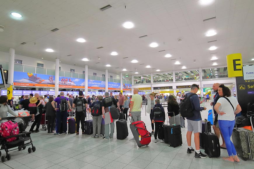 A busy check-in queue at London Gatwick Airport.