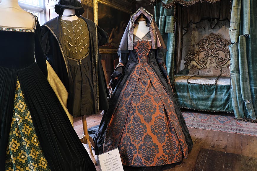 A collection of Tudor-period film costumes on display at Penshurst Place